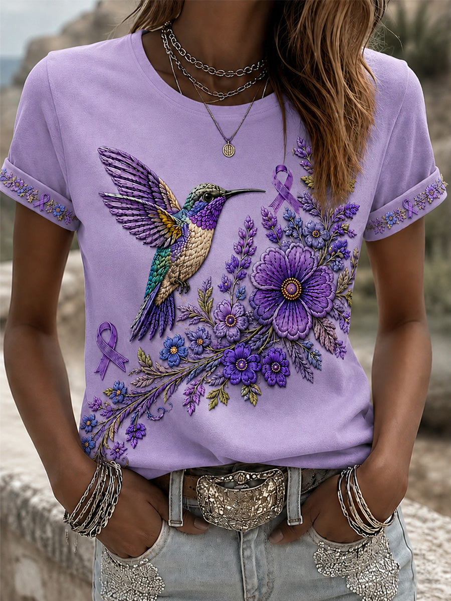 Damen-T-Shirt in Lila mit Blumen- und Kolibri-Print zur Sensibilisierung für Alzheimer