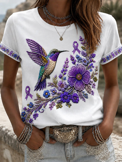 Damen-T-Shirt in Lila mit Blumen- und Kolibri-Print zur Sensibilisierung für Alzheimer