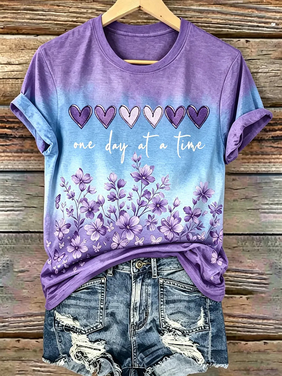 Damen-Print-T-Shirt mit lila Blumen und Alzheimer-Bewusstsein