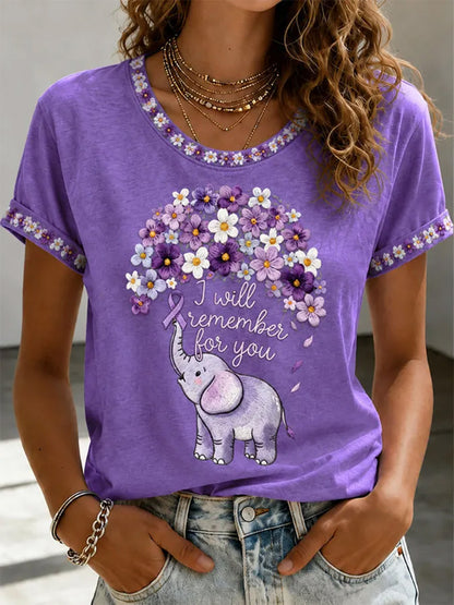 Damen-T-Shirt mit lila Blumenmuster und Aufdruck zur Sensibilisierung für Alzheimer