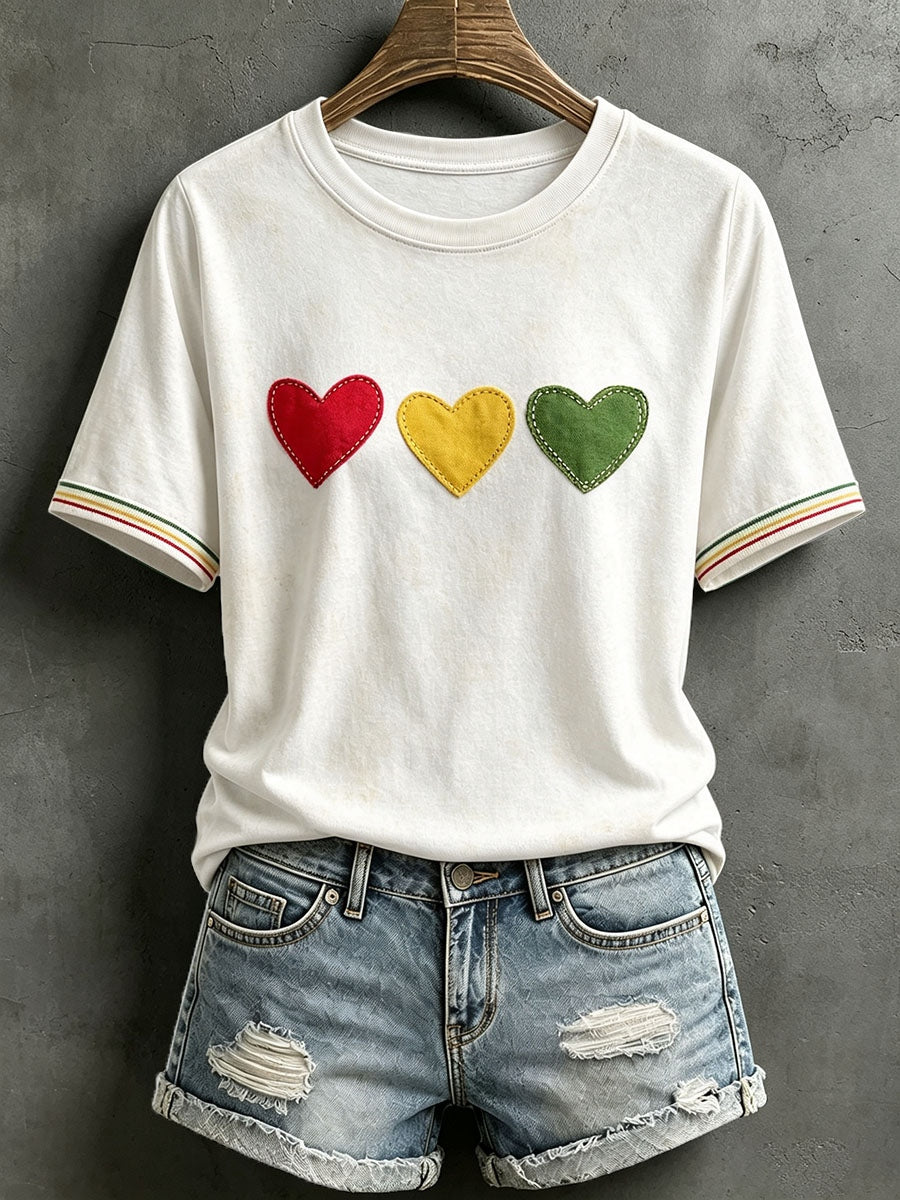 Damen-T-Shirt mit Herzmotiv im Reggae-Stil