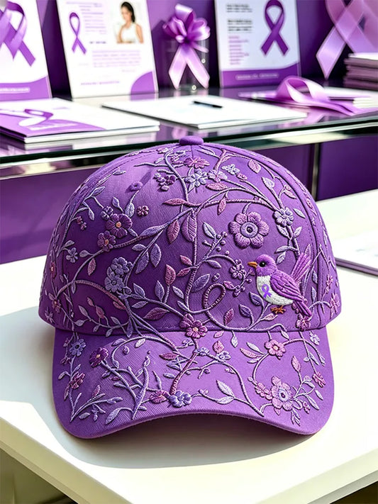 Unisex-Mütze in Lila mit Blumen- und Kolibri‑Muster zur Sensibilisierung für die Alzheimer‑Krankheit